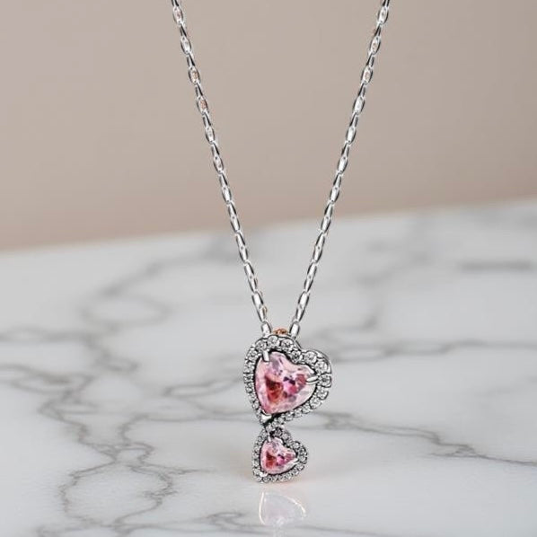 DANGLE PINK HEARTS NECKLACE