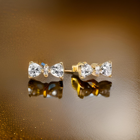 Tachuelas doradas con lazo