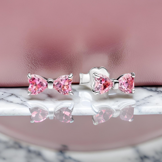 Tachuelas con lazo rosa